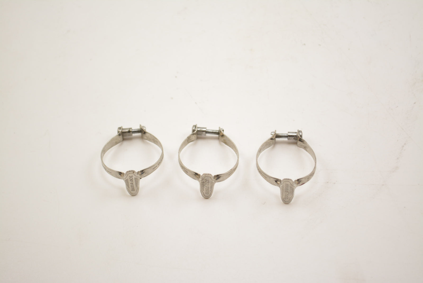 Vintage Shimano Dura-Ace Zugführungsschellen Befestigung am Oberrohr (3 Stk.) NOS frame clamps