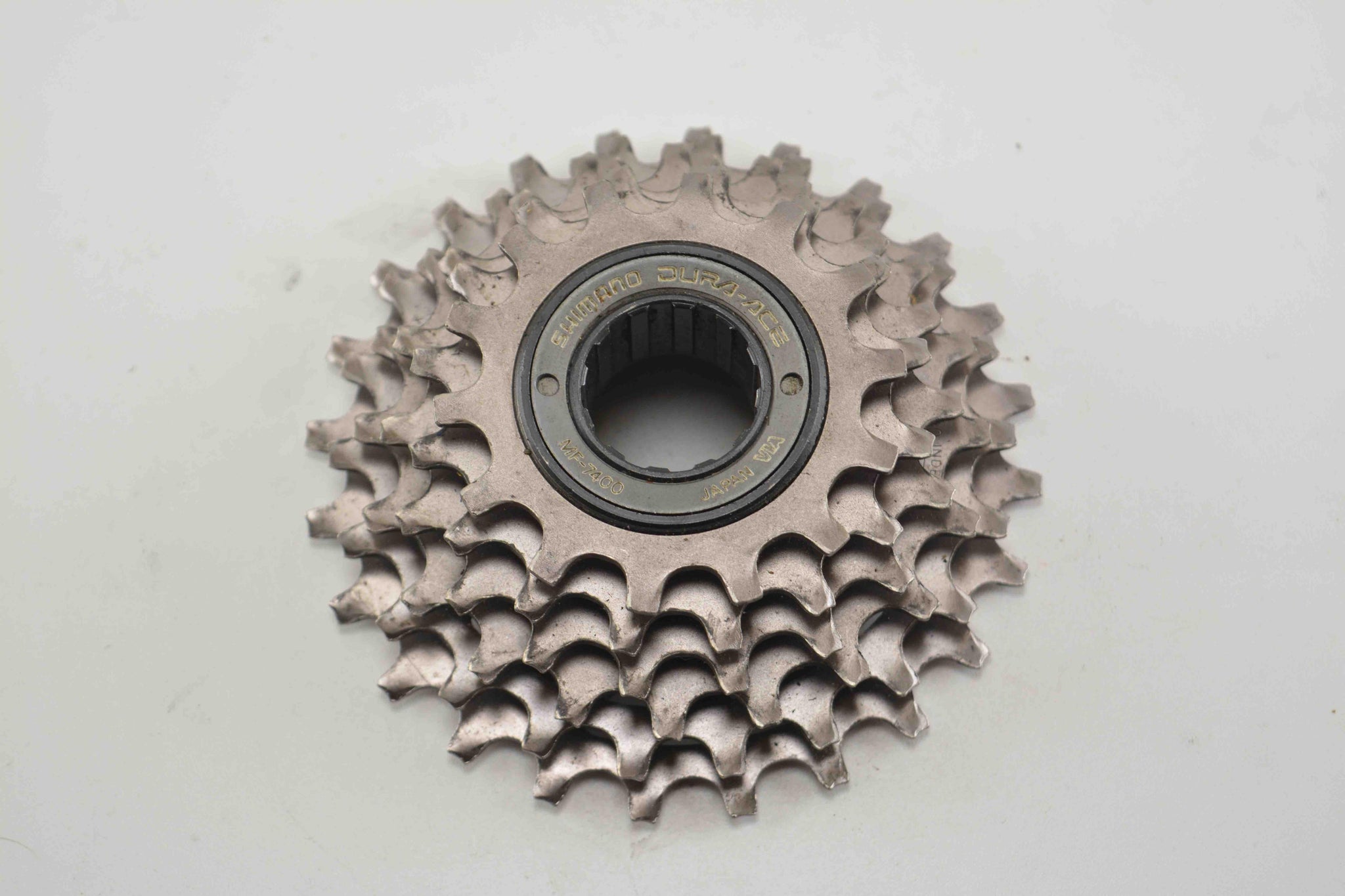 Shimano Dura Ace MF-7400 7-fach Schraubkranz 14-23 Zähne - Der Ritzler Shimano Dura Ace MF-7400 7-fach Schraubkranz 14-23 Zähne - Der Ritzler